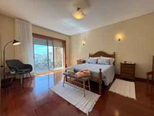 Ένα ή περισσότερα κρεβάτια σε δωμάτιο στο Machados Beach House