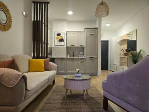 a living room with a couch and a table at Apartment Lule in Bar
