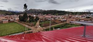 a view of a city from the roof of a building at Hospedaje Rumichaca in Cusco