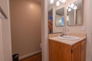 a bathroom with a sink and a mirror at Rr-interlaken 17 in June Lake +34 photos