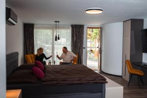 Postel nebo postele na pokoji v ubytování Apartmány VÍNO HRUŠKA Pardubice