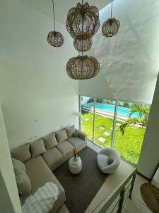 Posezení v ubytování Casa NUA - SurfCity El Salvador