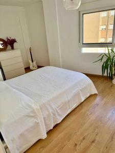 Ένα ή περισσότερα κρεβάτια σε δωμάτιο στο Private Room in Central Valencia