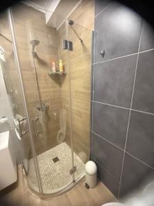 a shower with a glass door in a bathroom at Flat in Cascadas 21 in Sunny Beach