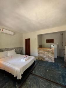 Ένα ή περισσότερα κρεβάτια σε δωμάτιο στο Beach Chalet Preá +64 φωτογραφίες