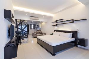 TV a/nebo společenská místnost v ubytování Winds Boutique Hotel