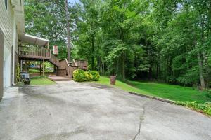 an empty driveway in front of a house at 5 Bedroom Mableton Hills Estate in Mableton