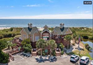 an aerial view of a large house on the beach at Condo in St James in Southport - Great amenities in Southport