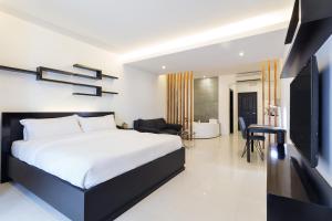 TV a/nebo společenská místnost v ubytování Winds Boutique Hotel