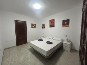 Postel nebo postele na pokoji v ubytování SFJ Apartamento Arrecife