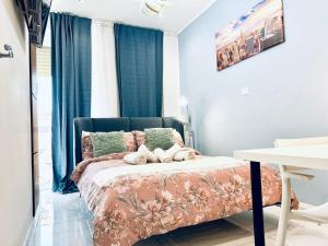 Ένα ή περισσότερα κρεβάτια σε δωμάτιο στο Luxury Hostel Apartment Vicino - Torino Centro - Metropolitana