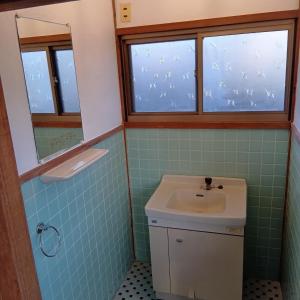 a bathroom with a sink and a window at Kaen - Vacation STAY 19039 in Aso