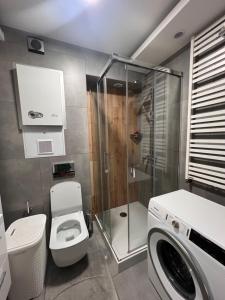 Ένα μπάνιο στο No 6 Pionierów Residence +1 φωτογραφίες