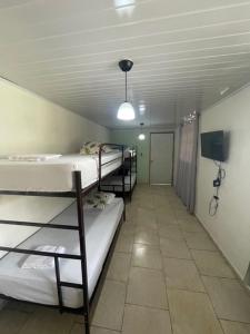 Hostal Síndigo客房内的一张或多张床位