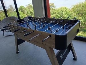 a large game table with a bunch of weapons on it at Abitare Mezcala Residencia in Isla de Mezcala