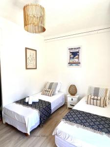 Vuode tai vuoteita majoituspaikassa Ti Cabanon. Appartement vue mer à Deshaies.