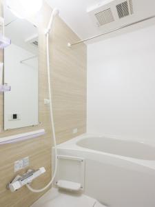 a bathroom with a white toilet and a sink at The River Up Palace - Vacation STAY 19369 in Kisarazu +43 photos