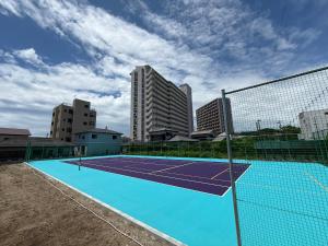 a tennis court on the roof of a building at Onjuku Garden Villa - Vacation STAY 54392v in Iwada