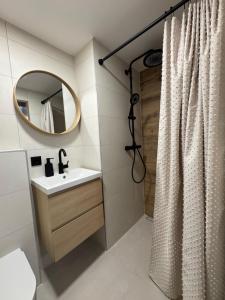 Ένα μπάνιο στο Rafael Apartment mit HS-Card - Greschuk Apartments +10 φωτογραφίες