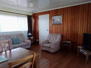 Posezení v ubytování Fletcher Christian Apartments - Manava Suites