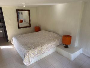 Postel nebo postele na pokoji v ubytování Jaragual EcoHostel