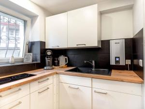 Η κουζίνα ή μικρή κουζίνα στο Litzi's Schwarzwald Apartment mit Kamin