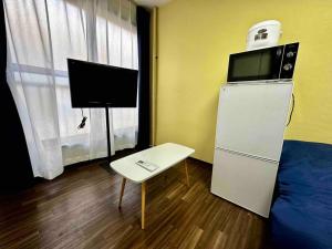 Μια τηλεόραση ή/και κέντρο ψυχαγωγίας στο Sky Heights - Vacation STAY 19629 +7 φωτογραφίες