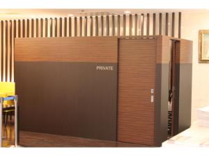 a large wooden door with the word private on it at Smile Hotel Sendai Kokubuncho - Vacation STAY 77739v in Sendai
