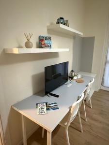 Telewizja i/lub zestaw kina domowego w obiekcie Il Mughetto