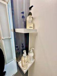 a refrigerator with two bottles of alcohol in it at YADORI - Vacation STAY 81027v in Osaka