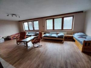 Posezení v ubytování Apartmány ŠTĚSTÍ