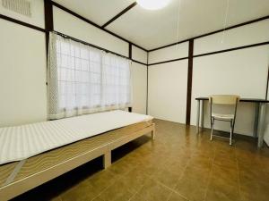 Postel nebo postele na pokoji v ubytování Sakura Kan - Vacation STAY 19677