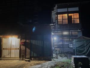 a building at night with the lights on at Kominka Mimi - Vacation STAY 19741 