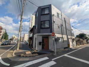 名古屋市にあるNagoya - House - Vacation STAY 19709の街の角にある建物