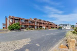an empty street in front of a building at Pacific Sands Resort #22 in Neskowin