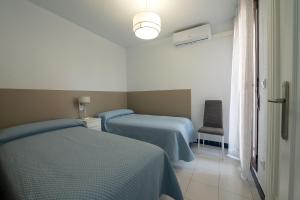 Ένα ή περισσότερα κρεβάτια σε δωμάτιο στο Holiday Beach Varadero 2 +41 φωτογραφίες