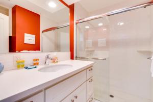a bathroom with a white sink and a shower at Pacific Sands Unit #10 in Neskowin +16 photos