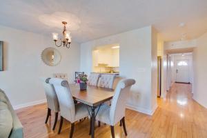 a dining room and kitchen with a table and chairs at Turn Of River 2F in Folly Beach