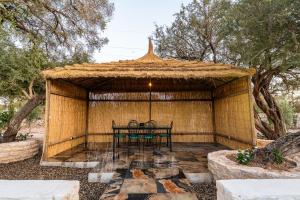Φωτογραφία από το άλμπουμ του Villa de Luxe avec 3 Chambres σε El Aadamna