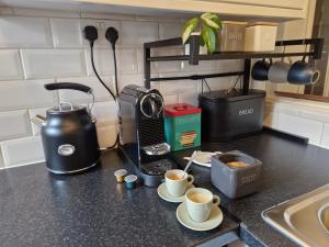 Kaffe- og tefaciliteter på West Street Views 1 - Cosy town centre apartment