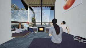 a group of people sitting in a living room with a fireplace at The Guest House Japan Hakuba in Hakuba