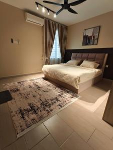 Postel nebo postele na pokoji v ubytování LS Homestay Sireh Residence Kota Bharu