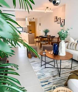 a living room with a couch and a table at Gardenia in Punta Cana