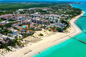 an aerial view of the resort and the beach at Gardenia in Punta Cana