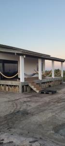 a building that has a lot at Casa Peninsula de Maraú in Marau +14 photos
