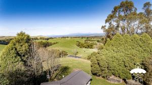 an aerial view of a golf course with trees at Ameys Ridge Prom Views in Foster