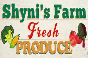 a sign with fruits and vegetables with the words farm fresh produce at Sunny Island Cliff Side Views in Anacortes