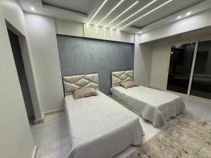 Ένα ή περισσότερα κρεβάτια σε δωμάτιο στο Down town 2 +6 φωτογραφίες