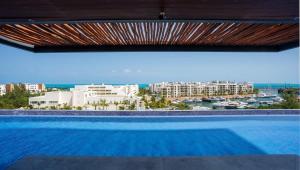 Πισίνα στο ή κοντά στο 2BR Beachfront Exclusive Condo w/ Top Features