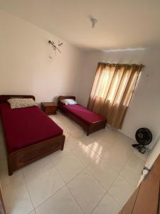 Posezení v ubytování BIA BELA Aluguéis por Temporada em BHS